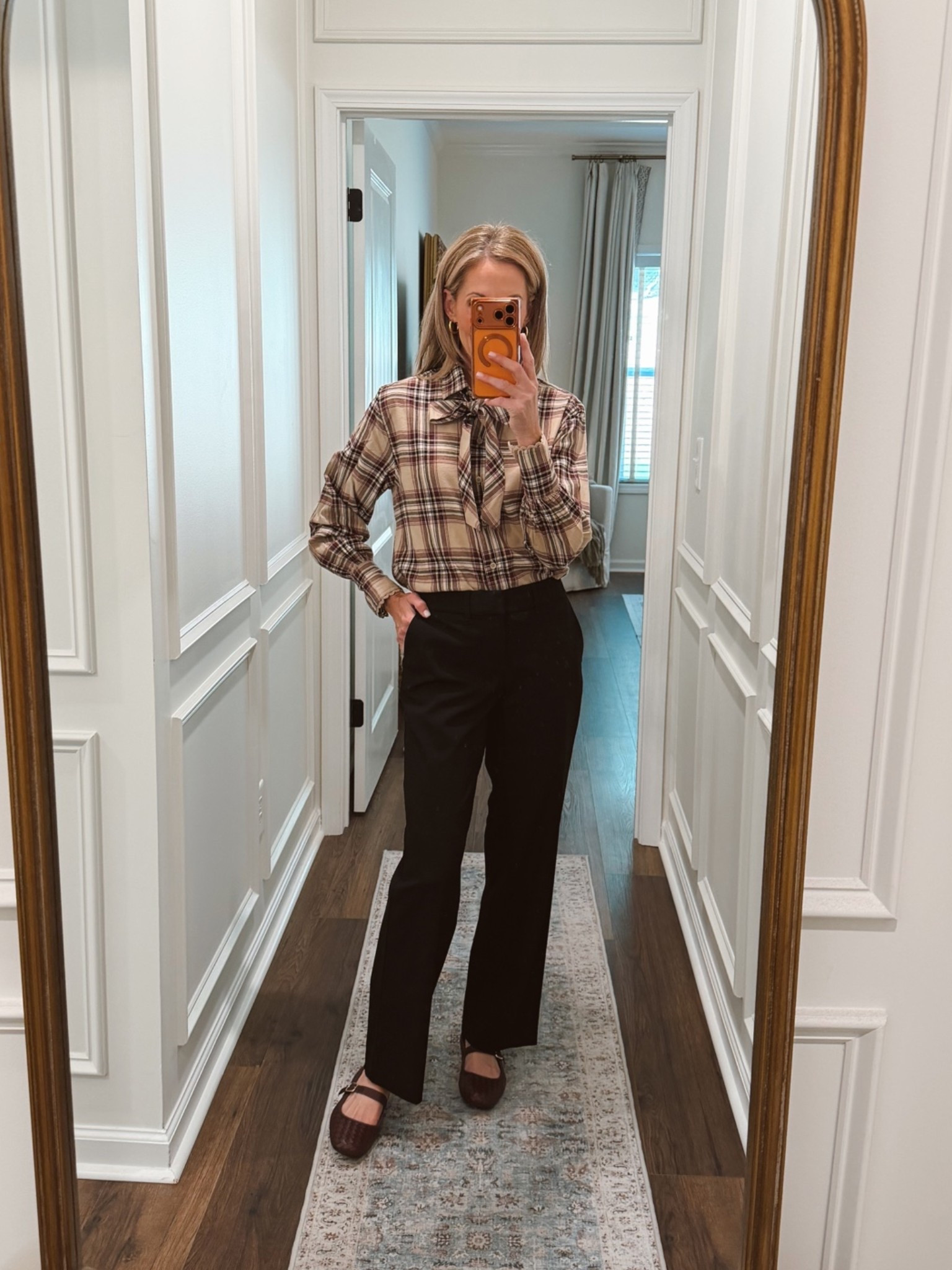 The perfect transition top where the bow can be taken on or off wearing with scoop pants size XS in pants and top.