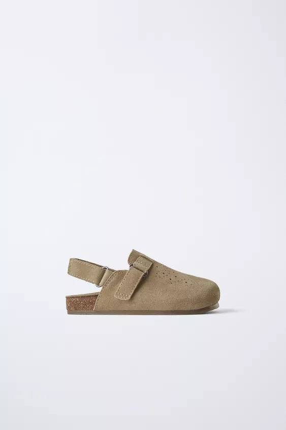 Suede finish 100% cowhide leather clog. Perforated detail and strap at instep. Hook-and-loop stra... | Zara US