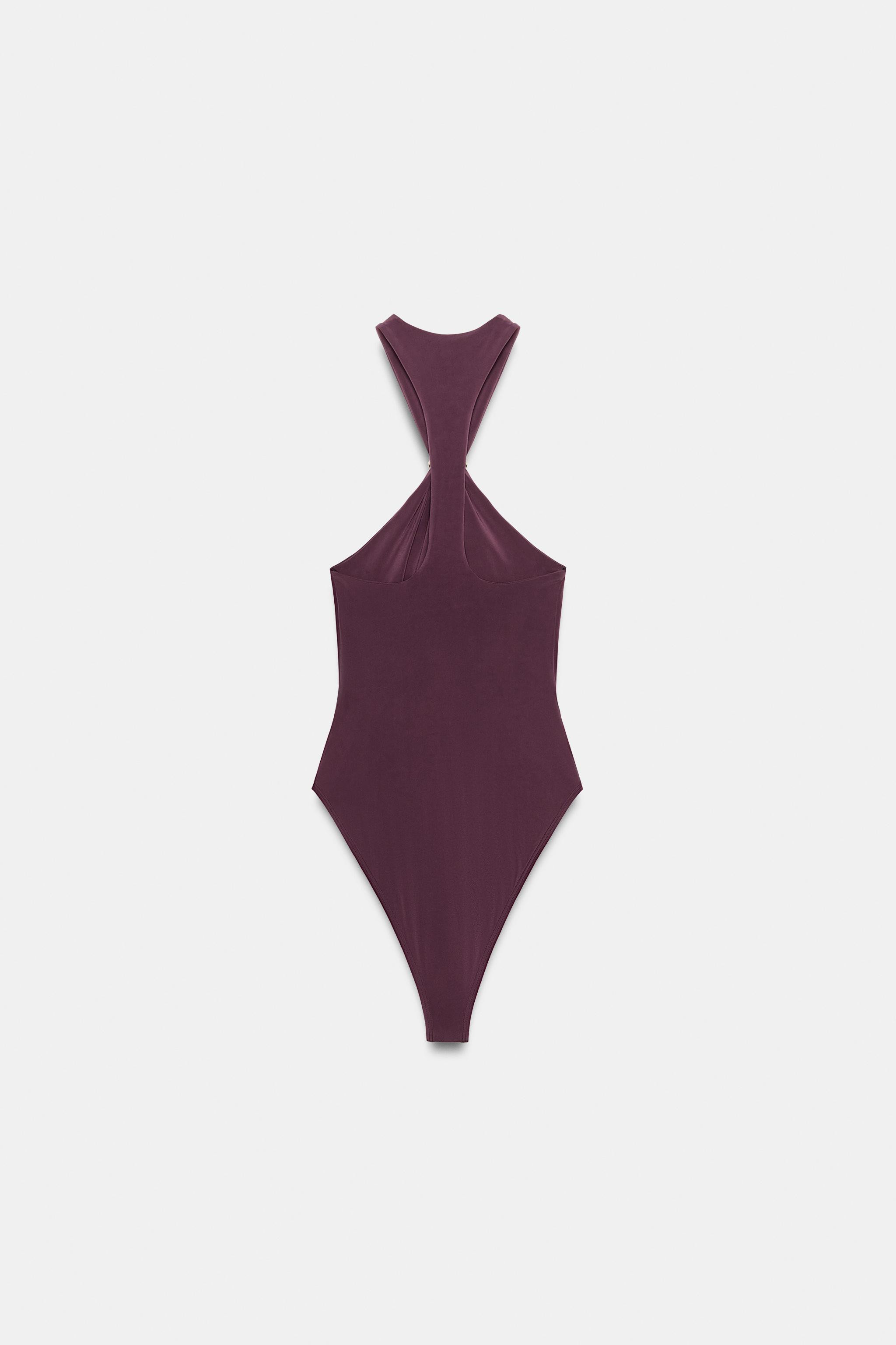 Bodysuit made of stretch fabric. Halter neckline. Features ruching detail and a metallic appliqu\... | Zara US