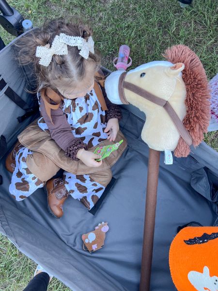 Caught ourselves a cowgirl 🤎 I don’t know what I would do without this toddler wagon! 

#LTKbaby #LTKkids #LTKHalloween