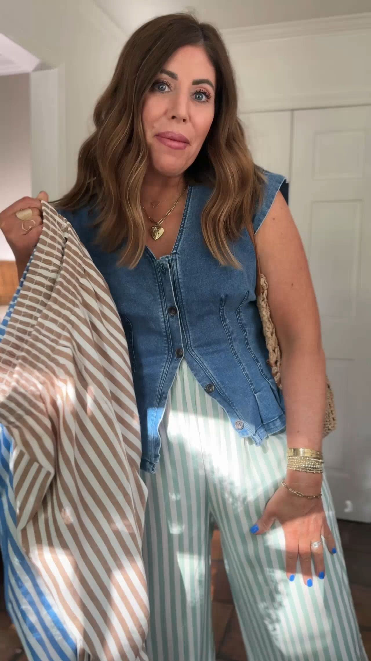 The cutest new pants on Amazon: part five

These look just like the viral look for less pants that came out a few years ago—same fit, and style however, these are striped and made with a tencel rayon blend.
They run true to size, but if you are in between sizes or want a looser fit, then you may want to size up. I sized up to a large.

they are lightweight and super comfy. 

You can dress them up or down, wear them to work, all your errands, vacation and more.


Look for last denim button up cap sleeve vest is so cute and comfortable. It comes in a few other colors. I am wearing a large as it is on the fitted side identical to the free people vest.

White T-shirt, size medium

Textured muscle sweater, size medium
 

 #LTKootd #LTKOver40 #LTKSaleAlert