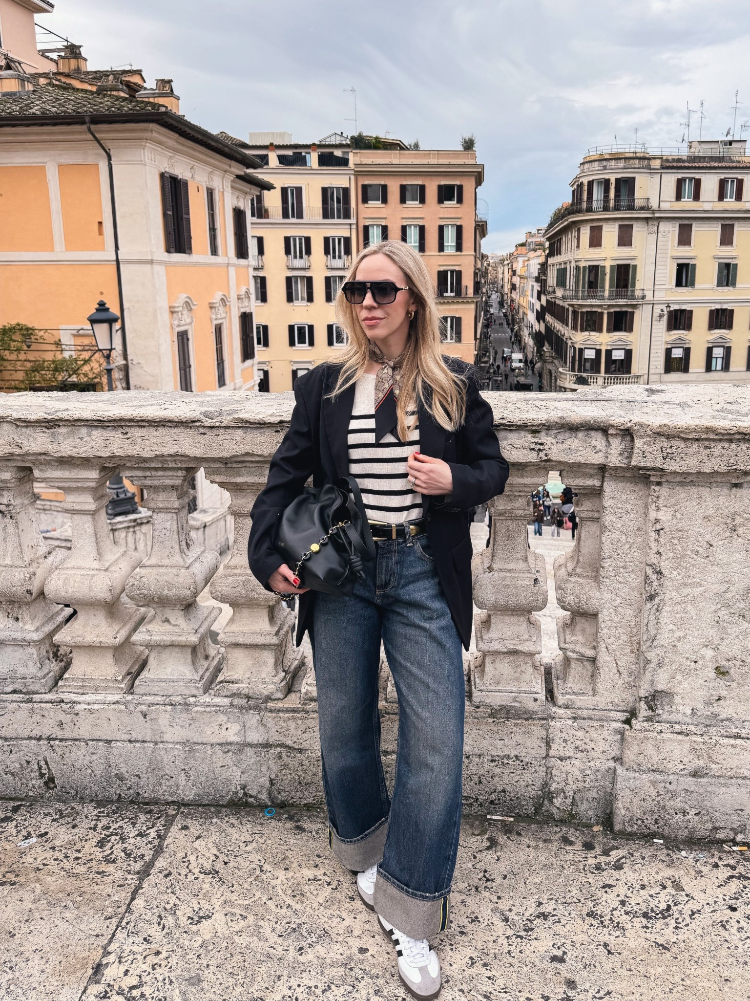 Spring outfit, European vacation, oversized black blazer, striped sweater, Gucci silk scarf, @Zara cuffed baggy jeans, Adidas Samba sneakers, Loewe Flamenco pouch handbag 

#LTKOver40 #LTKTravel #LTKSeasonal