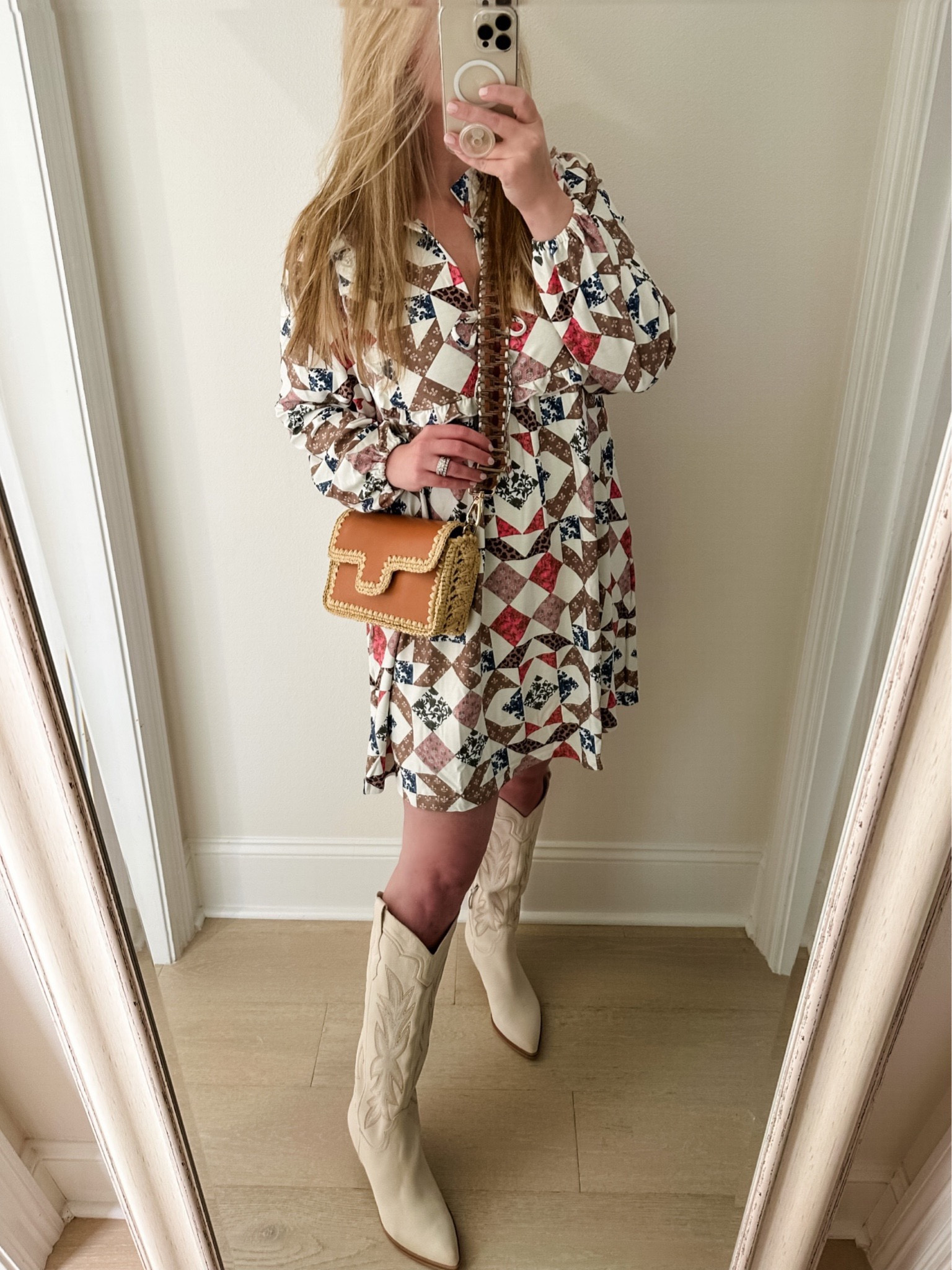 Sized up half a size in the boots. Dress is TTS. Western dress, western outfit, cowboy boots, denim dress, turquoise earrings, gold belt, woven chain strap shoulder bag. 


#LTKCon