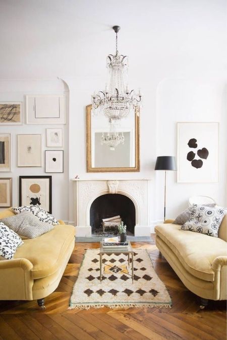 Parisian living room 

Crystal chandelier, yellow, velvet sofa, Moroccan, shag rug, black and white abstract, framed wall, art, small glass, rectangular, coffee, table, stone mantle, fireplace, floor, lamp with black shade, gold arched, mantle mirror

#LTKFind #LTKhome #LTKstyletip