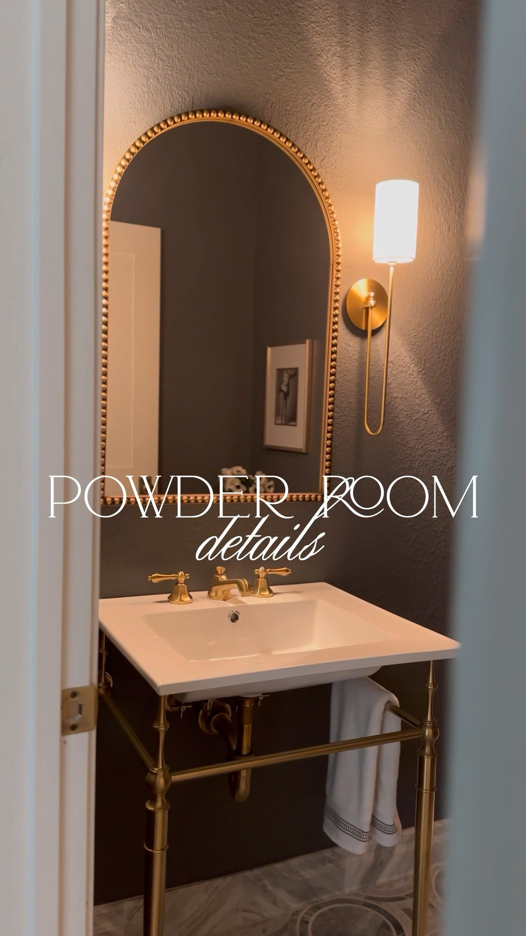 Moody powder room decor details including this favorite Amazon arched beaded gold mirror, console style sink, and modern sconces!

#LTKStyleTip #LTKSaleAlert #LTKHome