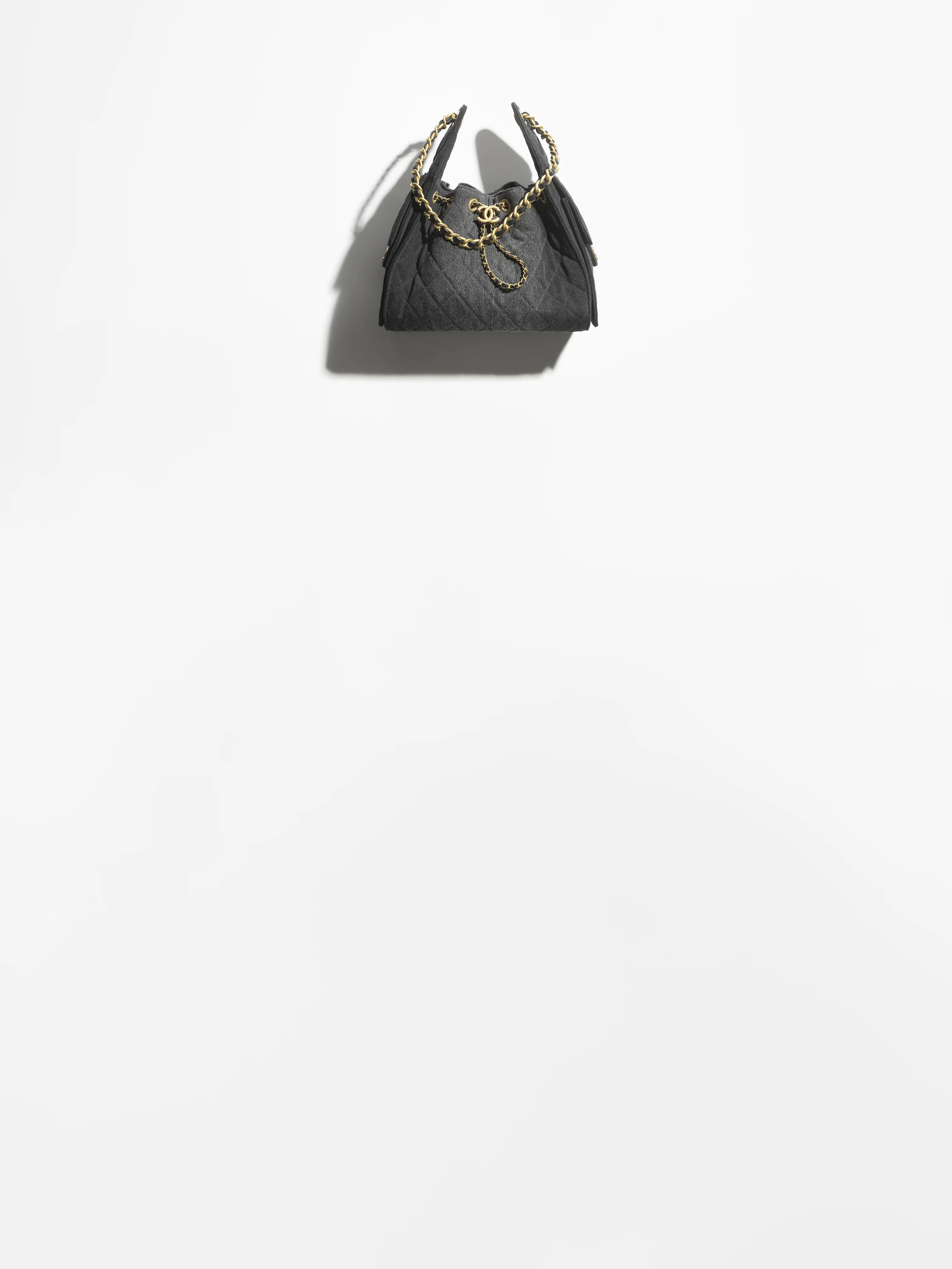 Chanel 25 small handbag, Washed denim & gold-tone metal, black — Fashion | CHANEL | Chanel, Inc. (US)