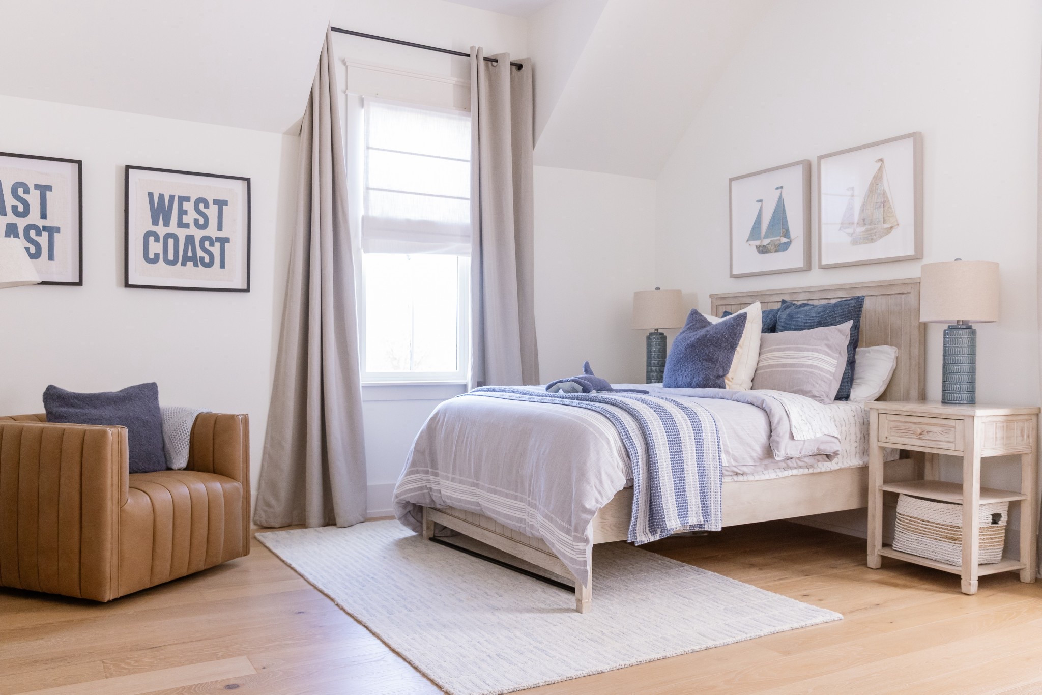 A timeless boys’ room layered in warm neutrals, blues and classic textures creates a calm, design-forward space that grows with him.

#LTKmomlife #LTKHome #LTKKids