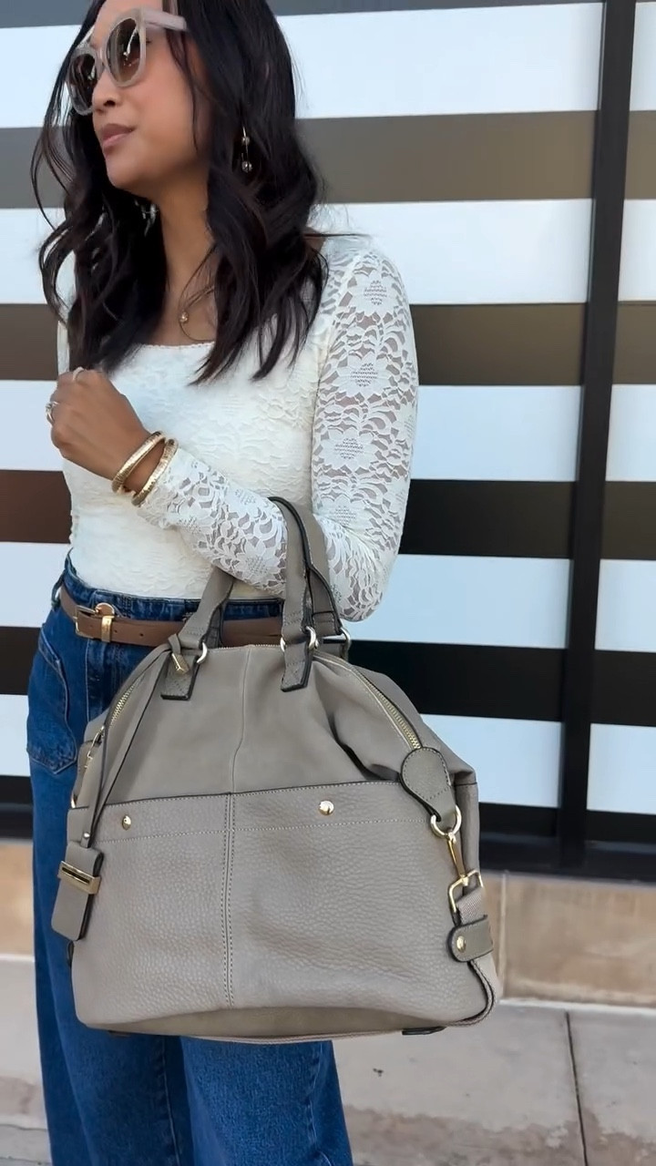 I’ve been carrying the @modaluxe London Satchel lately and I’m obsessed 👜✨ The mix of suede + vegan leather with the gold hardware feels so chic, and the inside is just as good — pretty lining and pockets that actually keep me organized (a win for both work and travel 🙌).

Shop @modaluxe bags in my bio! 

@modaluxe
#modaluxe #modaluxebags