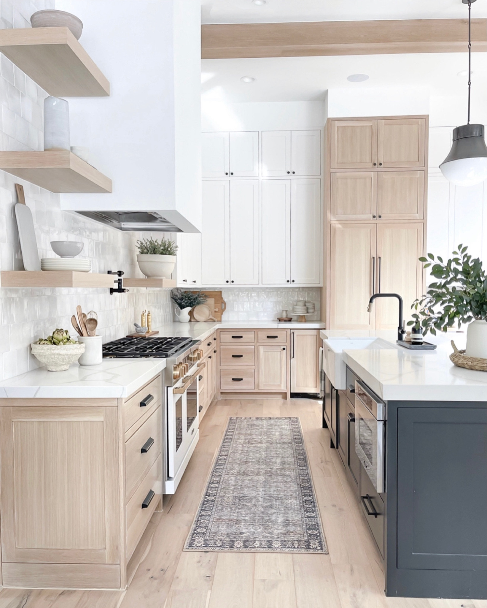 Kitchen rug, Kitchen runner, kitchen tile, Zellige tile, backsplash tile, kitchen faucet, kitchen pendants, black pendants, cabinet hardware, kitchen decor, home decor, Loloi rug, neutral rug 

#LTKFind #LTKSeasonal #LTKhome