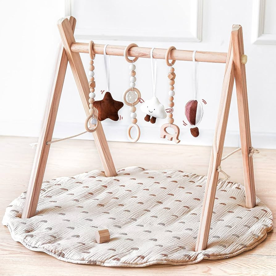 Wooden Baby Play Gym with Mat, Foldable Baby Play Gym Frame Activity Gym Hanging Bar with 6 Gym B... | Amazon (US)