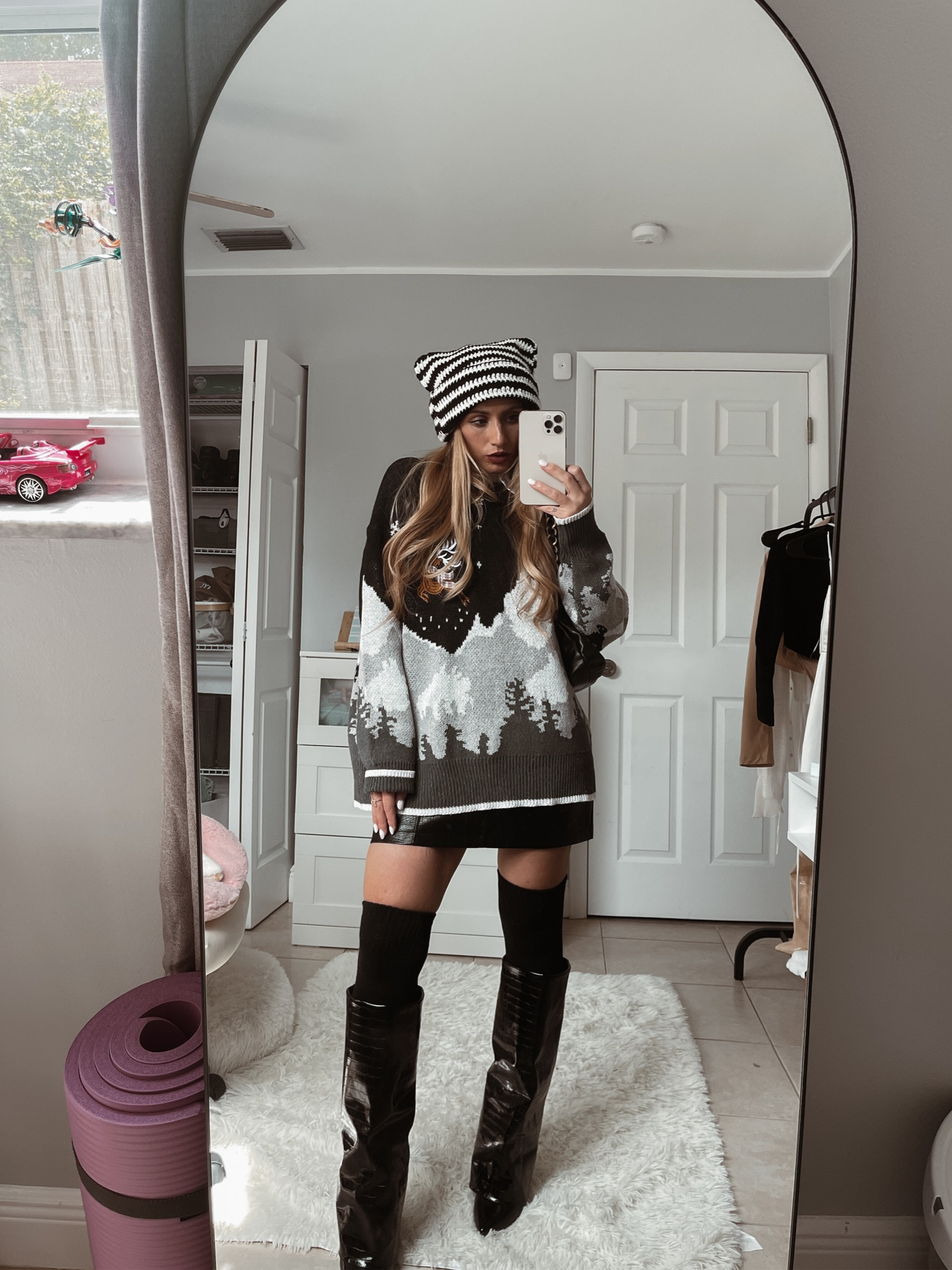 Cute holiday outfit, boots outfit, sweater outfit, Christmas sweater, beanie outfit, black boots, oversized sweater, fall outfit, Y2k style, grunge style 

#LTKstyletip #LTKshoecrush #LTKfindsunder50