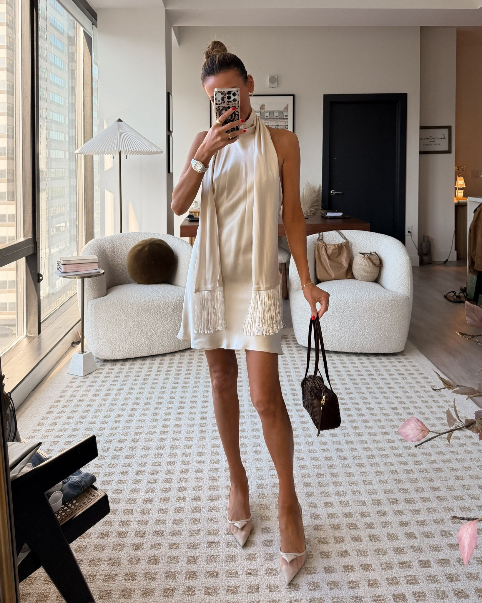 This mini satin dress is a game changer for date nights, cocktail parties, rehearsal dinners, and even Mother’s Day dinner! The sash detail makes it such a unique piece and the color makes it so versatile! Wearing an xs

#LTKootd #LTKMothersDay #LTKOver40