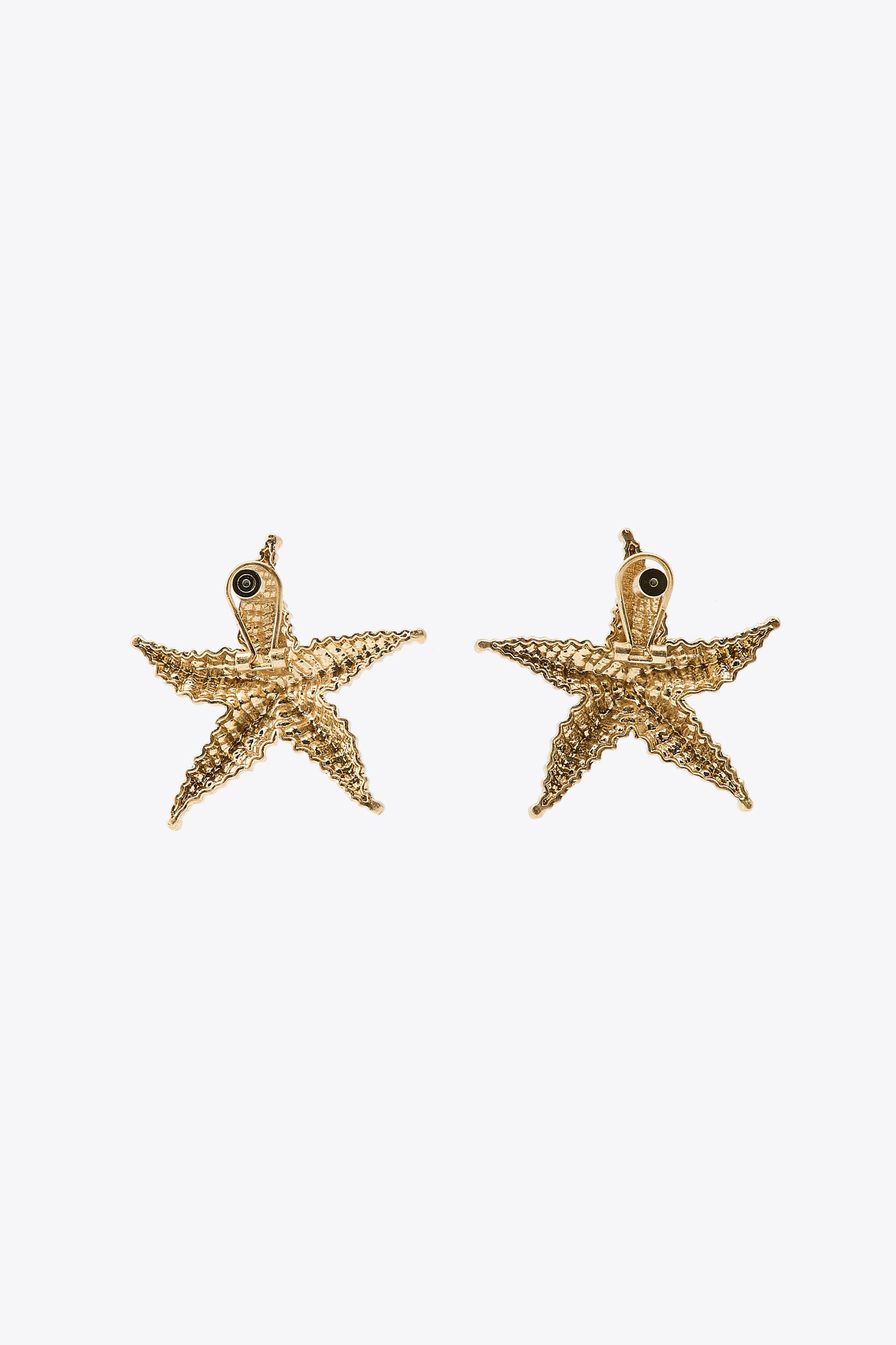 Embossed metal starfish earrings. Push-back and clip fastening. | Zara UK