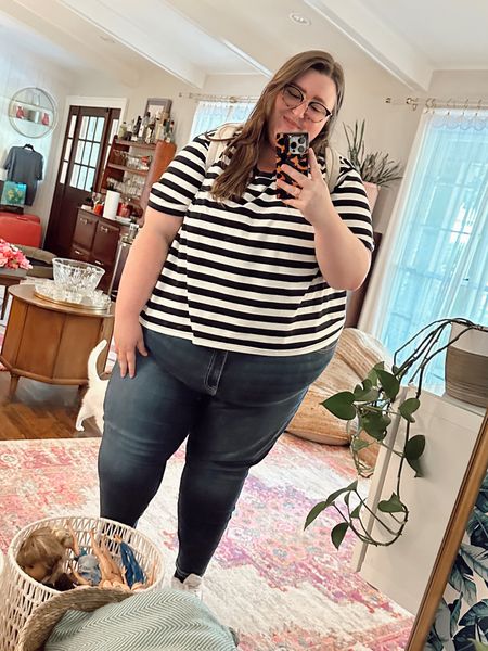 Plus size casual OOTD. Caroline is wearing a boxy t-shirt from Amazon (5X), a pair of Torrid jeggings (sized up to a 30 and they were great in the first hour or so of wear but I think I should have kept my typical size 28 bc they stretched out some throughout the day), and a pair of Reebok sneakers 

#LTKcurves #LTKSeasonal #LTKstyletip