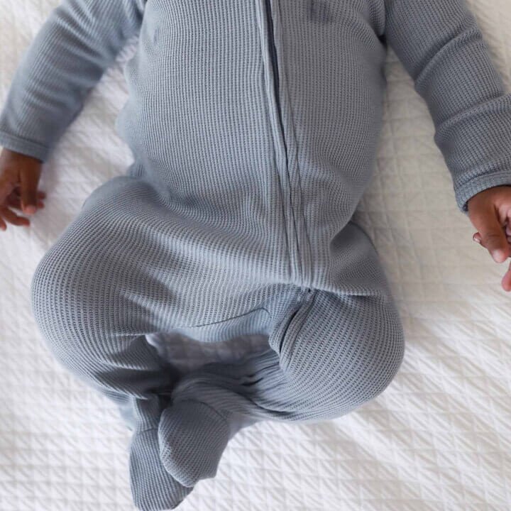 Dusty Denim Waffle Bamboo Zipper Footie | Caden Lane