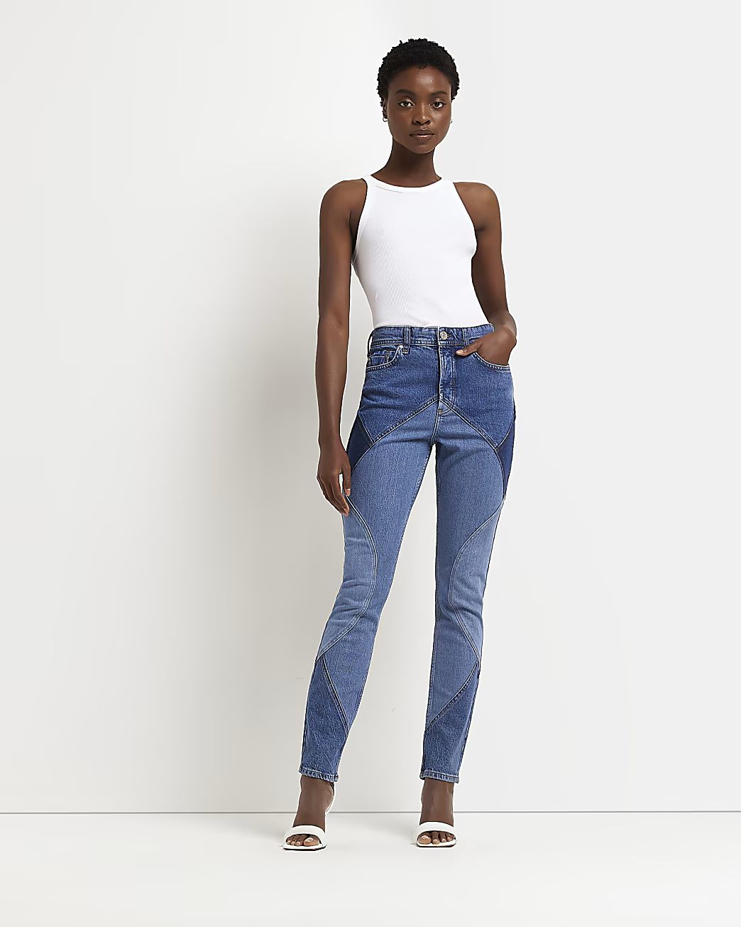 Blue denim mid rise slim jeans | River Island (US)