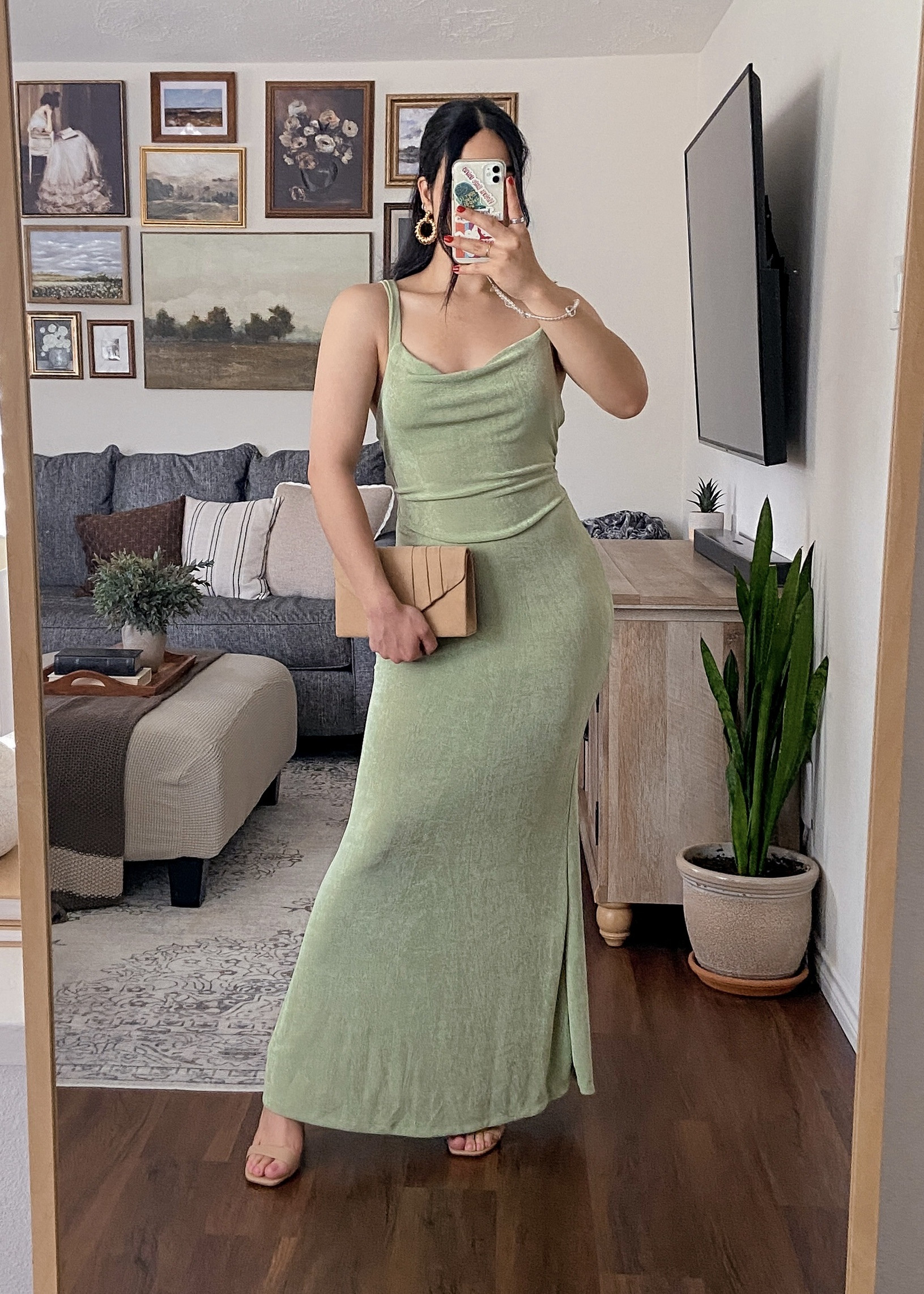 draped in the soft elegance of sage green! 🌿👗

i’m wearing this floor length dress in a size medium and it fits true to size. i love the color, draping neckline, and tie-back detail on this one. this dress would be nice for any special occasion. 

🏷️: summer dress, amazon fashion finds, wedding guest dress, midi length dress, floral dress, short sleeve dress, party dress, casual dress, 

#LTKSummerEdit #LTKFindsUnder50 #LTKSeasonal