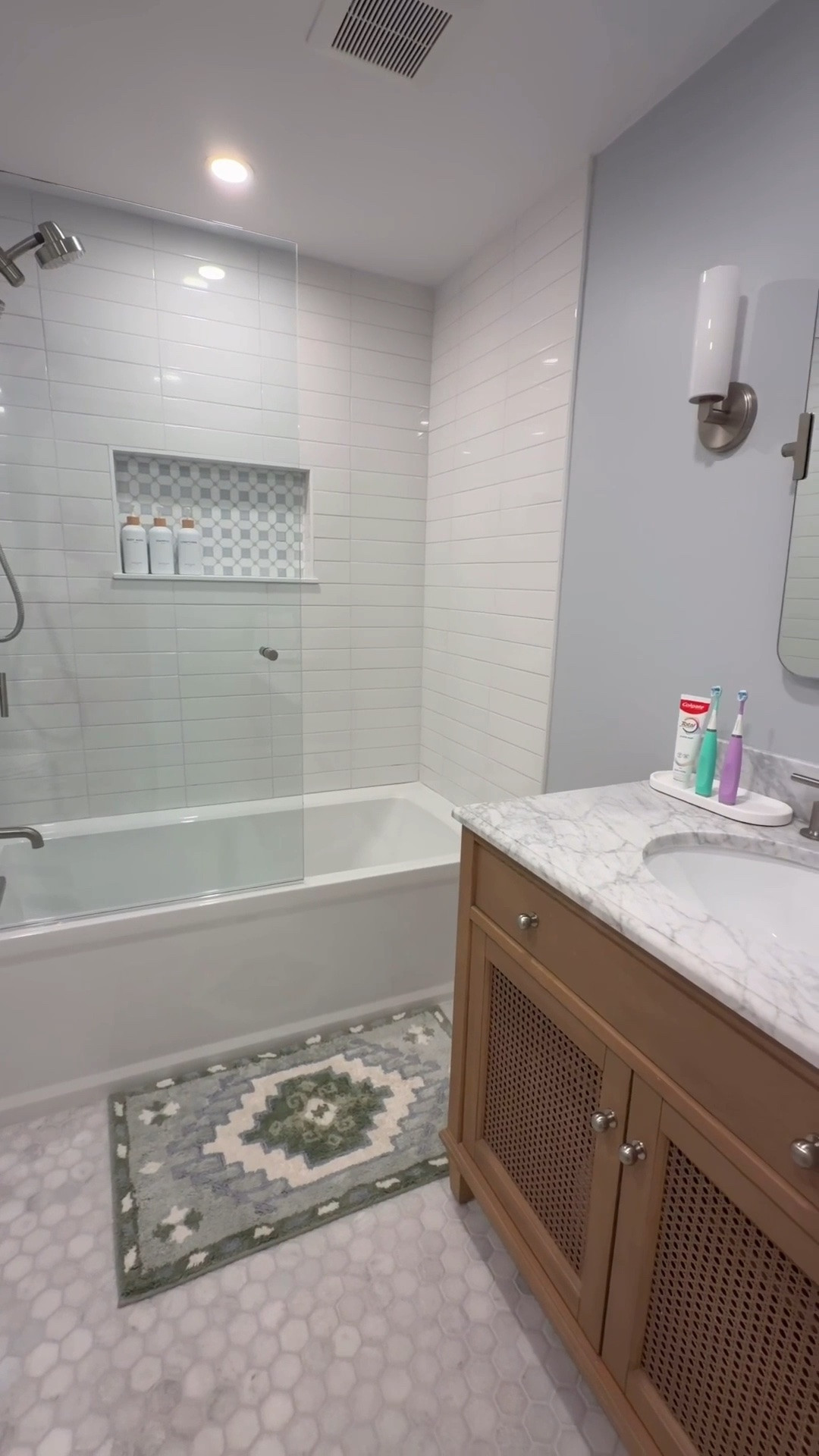 This bathroom may belong to our boys, but it’s one of the prettiest rooms in our home. The mix of blue, white, and natural wood tones keeps it feeling fresh, classic, and not overly themed - while still being kid-friendly and functional for everyday life.

#LTKHome #LTKKids