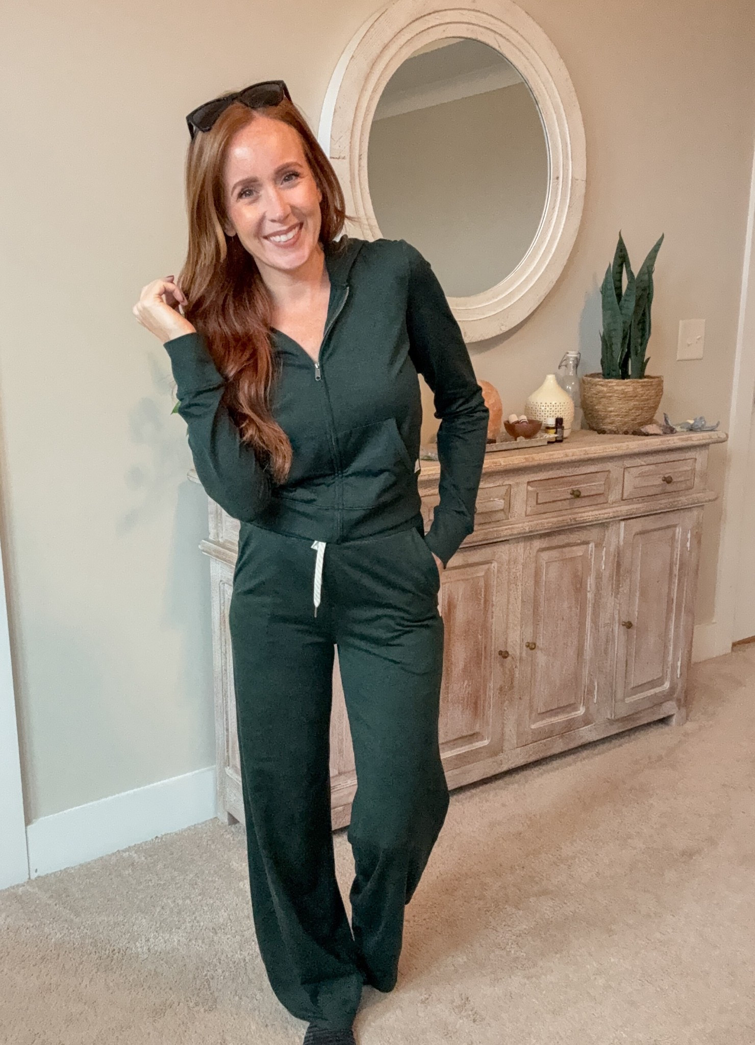 I am in love with this lounge set! The fabric is butter soft, the pants are wide leg, high waisted, and the matching zip up is cropped for the perfect fit together. I sized down in the pants and got my normal size in the zip up. Comes in a bunch of colors but the deep green is absolutely stunning!

#LTKActive #LTKStyleTip #LTKOver40