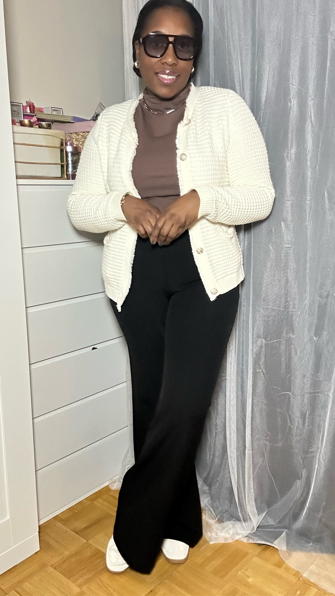 Work outfit! I got you covered. Wearing a pair of flat sneakers with a pair of flare pants elevates your body and creates a lean look.
Pairing it with a warm cardigan because it’s cold!

Midsize | midsize style | midsize for check | work outfit | office outfit 

#LTKMidsize #LTKgrwm