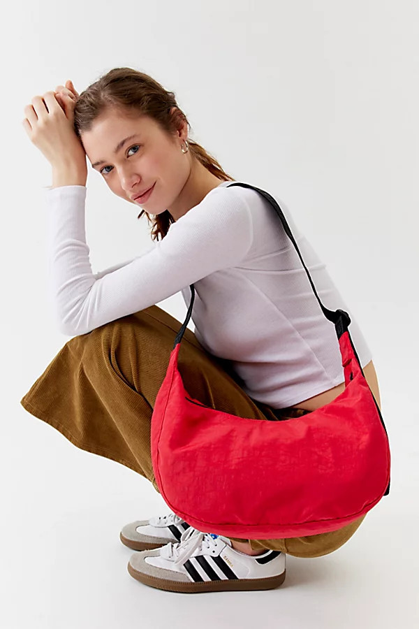 BAGGU Medium Nylon Crescent Bag in Candy Apple at Urban Outfitters | Urban Outfitters (US and RoW)