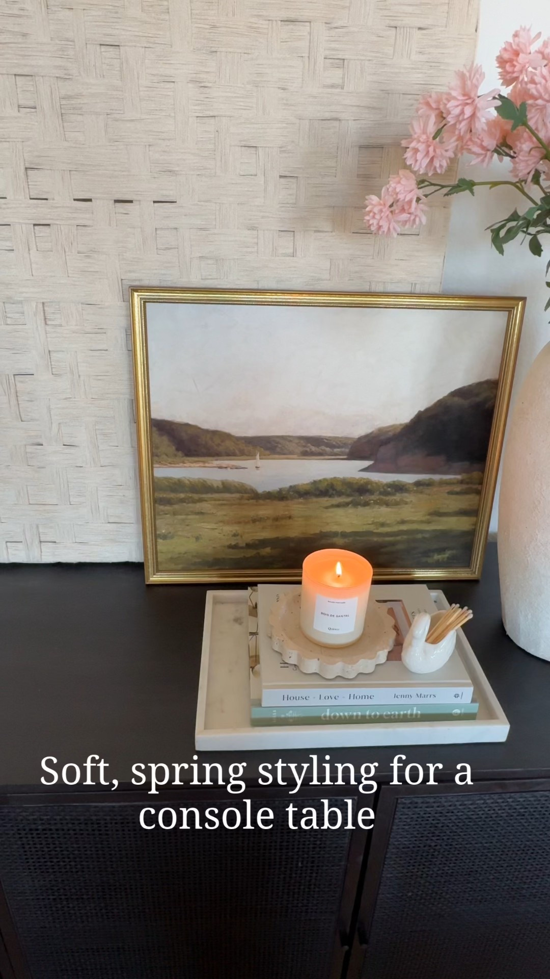 Neutral modern console table styling ideas featuring layered home decor with art, decorative trays, neutral coffee table books, soft pink spring florals, ceramic vases, elegant candles, and swan matches for a warm and timeless entryway look. This modern neutral console table decor is perfect for spring home refresh inspiration, minimalist home styling, and elevated everyday decor using affordable home finds, classic accessories, and designer-inspired styling tips that work for entryways, living rooms, and hallway console tables.

#LTKSaleAlert #LTKHome #LTKSeasonal