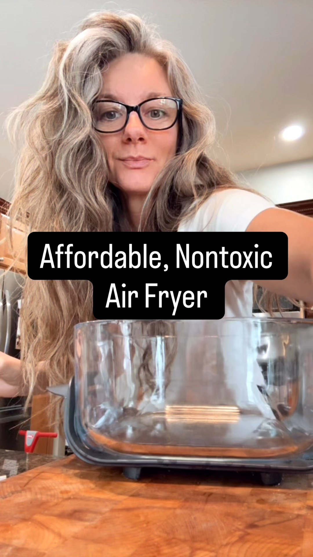 I found this air fryer at target and took a chance on it! I’ve been using it now for a couple months and wanted to share it with you bc it’s been great!
It’s got glass bottoms that are like large Tupperware with handles so the food is heated in glass. There is a large bowl and a smaller bowl. 

You can bake things, air fry, make extra crispy depending on the setting you use. 

Once done, you can serve the food straight from the glass bowl and when down, it has a lid you can use to store it for leftovers. 

The best part though is that the bowls can go straight into the dishwasher!!!!! The easiest one to clean I’ve ever seen. 