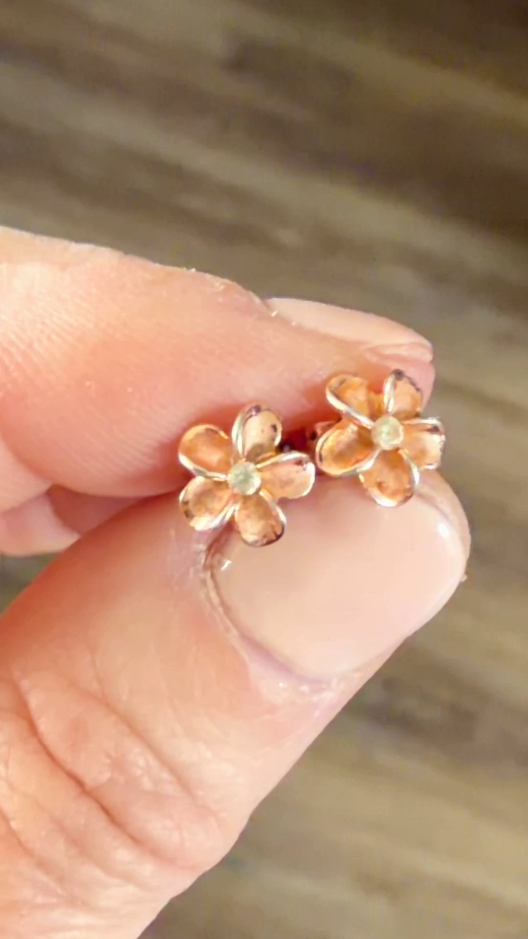 These rose gold plumeria earrings give me a little piece of the island when I can't be there. I love that they are gentle on my sensitive ears, never bothering them at all. I almost never take them out. Comfortable and just neutral enough to go with anything. 

 #LTKMothersDay #LTKmomlife