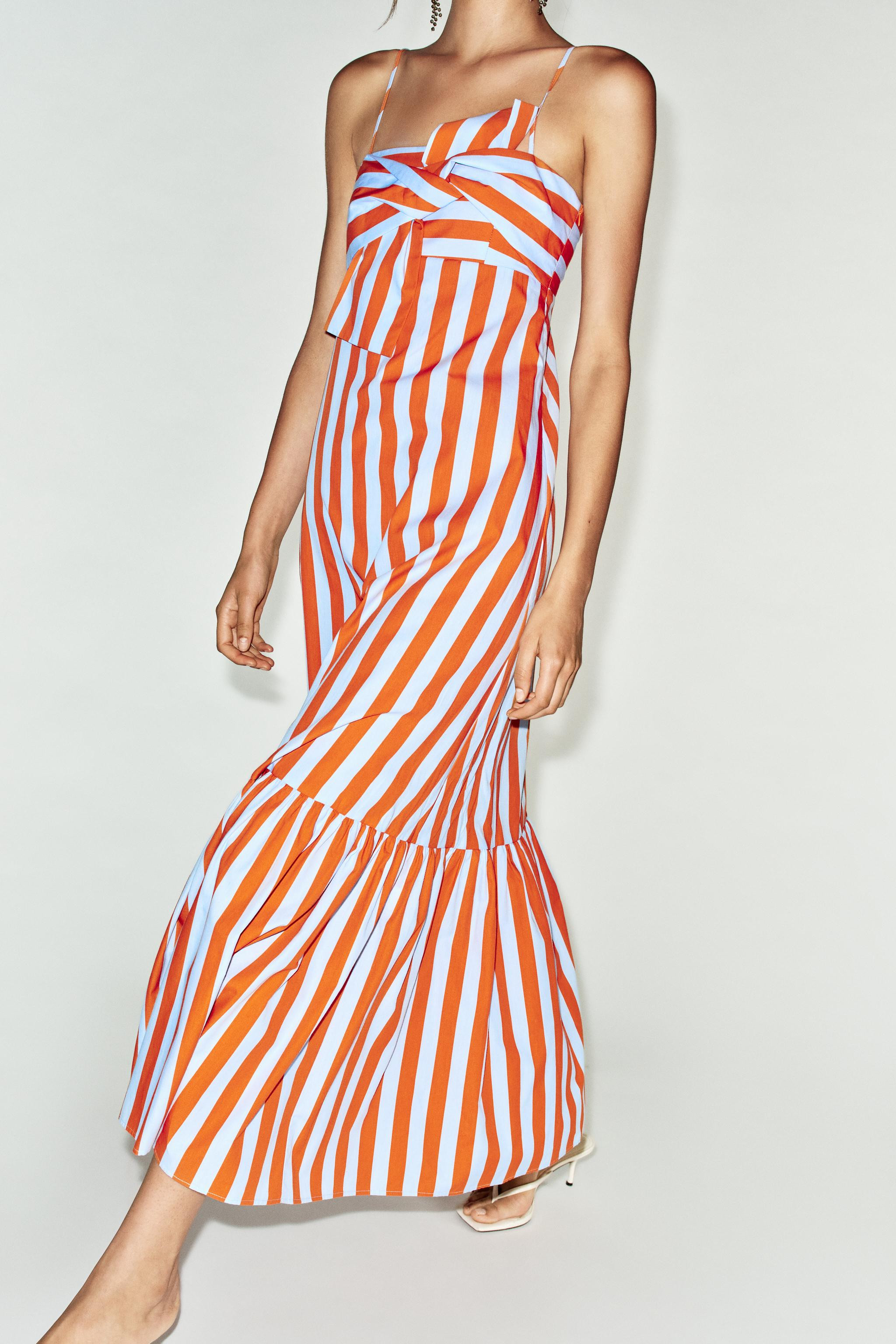 Model height: 183 cmStraight-neck dress featuring a front knot, adjustable thin straps, an elasti... | Zara UK