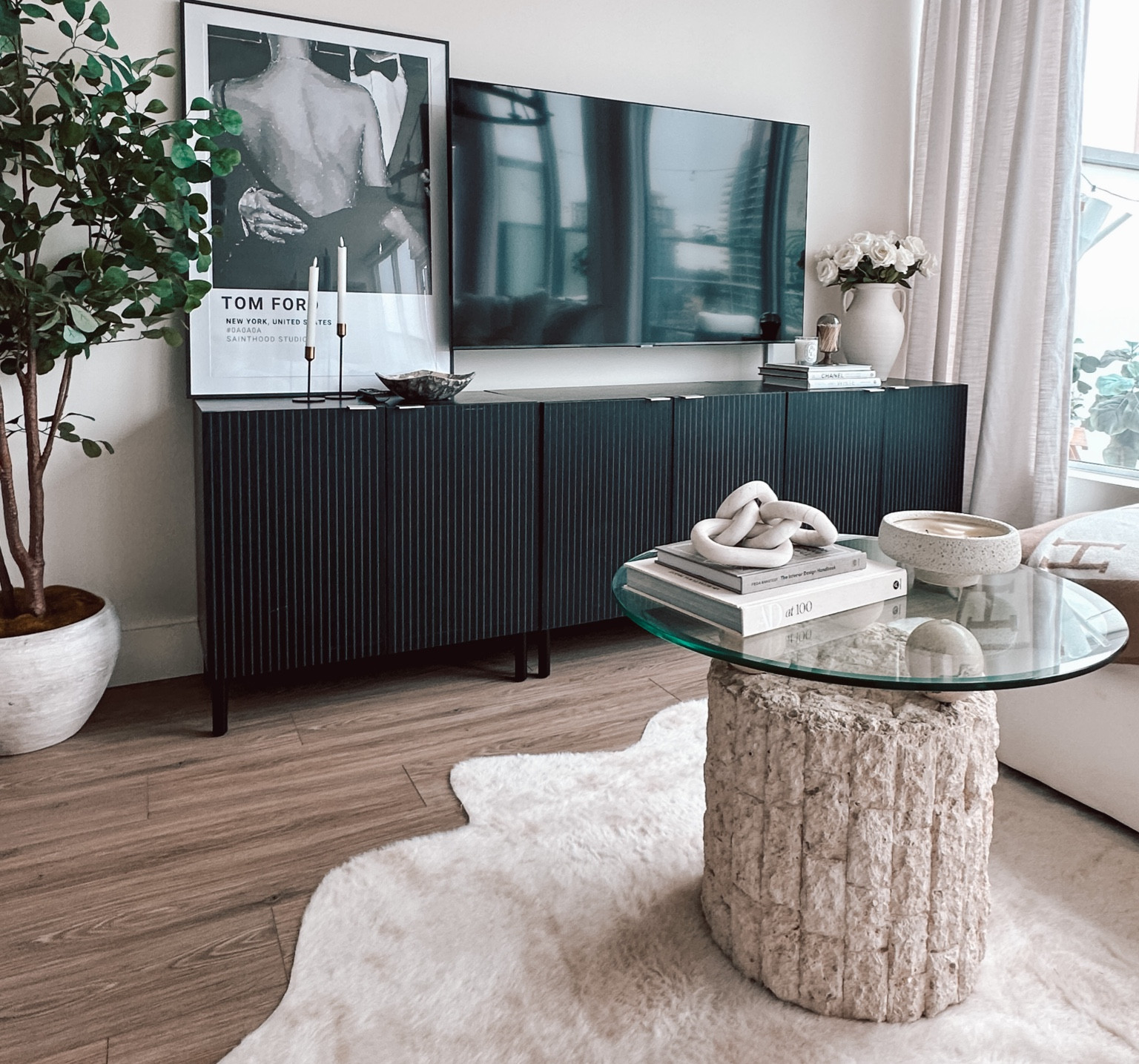 Modern organic home 🤍 #transitionalhome #neutralhome #travertine #cowhiderug #natural #blackandwhite #wabisabi