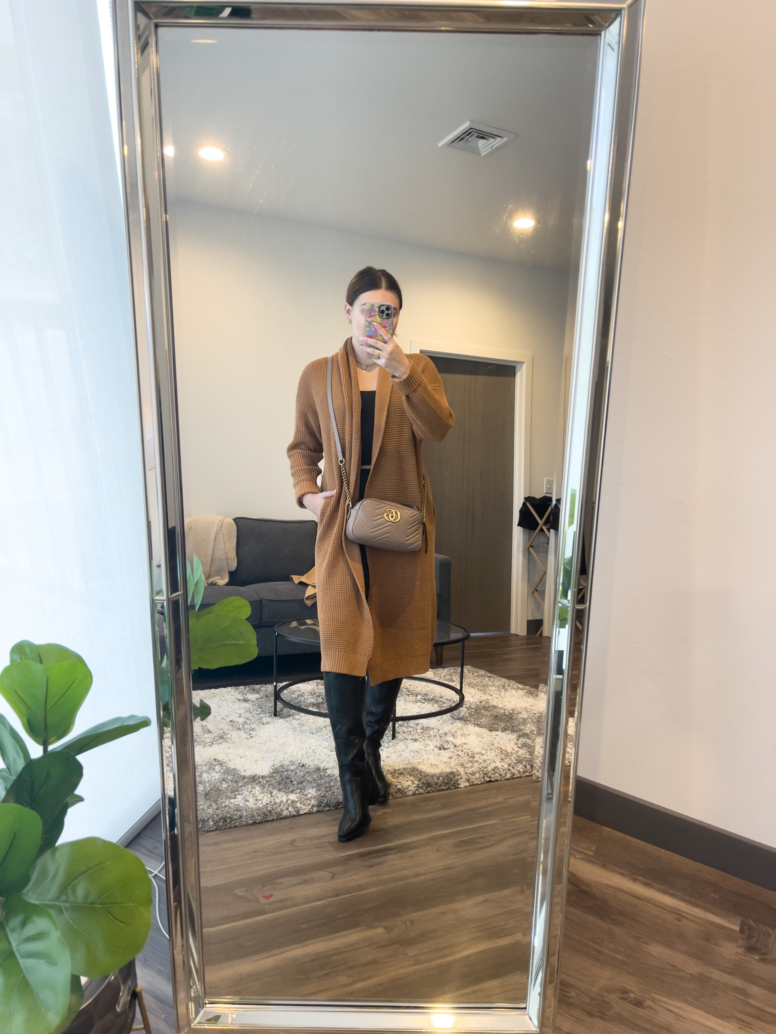 Long cardigan outfit idea for fall! Perfect for brunch or church

I’m wearing a size 10 cardigan, M tank and leggings with size 9 boots 

#LTKunder100 #LTKSeasonal #LTKstyletip