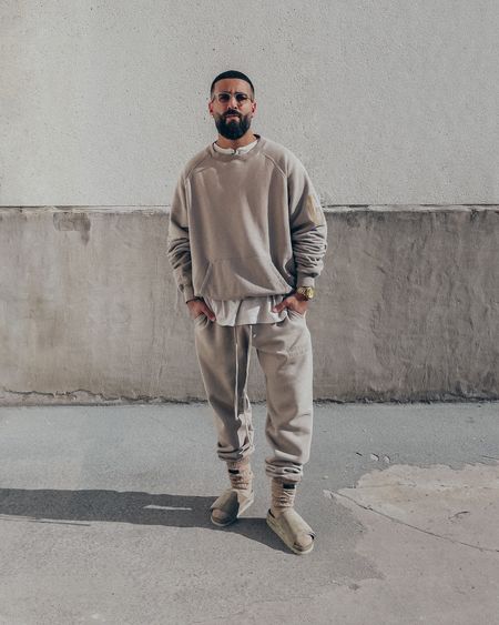 FEAR OF GOD FG Sweatshirt in ‘Vintage Paris Sky’ (size M), American Allstars Henley tee in ‘Vintage White’ (size M), and 7th Collection Socks in ‘Beige'. ESSENTIALS sweatpants in ‘Smoke’ (size M). FEAR OF GOD x BIRKENSTOCK Los Feliz sandals in ‘Taupe’ (size 41). FEAR OF GOD x BARTON PERREIRA glasses in ‘Matte Taupe’. A relaxed and elevated men’s look that is cozy and layered for warmth. Add an overcoat to complete the outfit and you’re good to go for a lunch or chill day out. The Henley featured in this outfit is currently up to 70% off on sale. 

#LTKstyletip #LTKmens #LTKsalealert