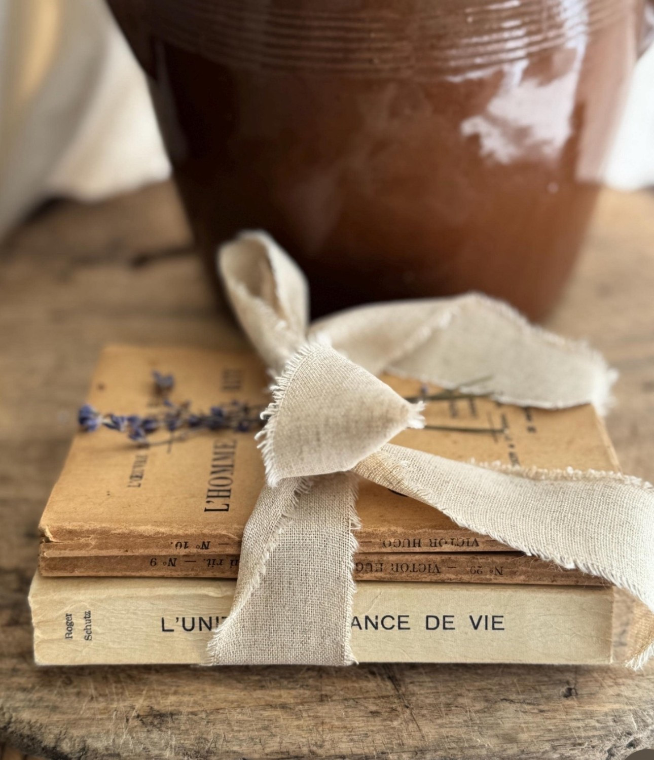 
A soft, timeworn stack of three vintage French books – perfect for adding a quiet, collected feel to a console, nighstand or dresser.

Their warm, faded paper covers, foxing, and worn edges give just the right amount of patina for French farmhouse, European cottage, or collected Old World styling. Beautiful stacked on their own, tucked under a candle, or layered with a small crucifix or rosary.



#LTKStyleTip #LTKHome