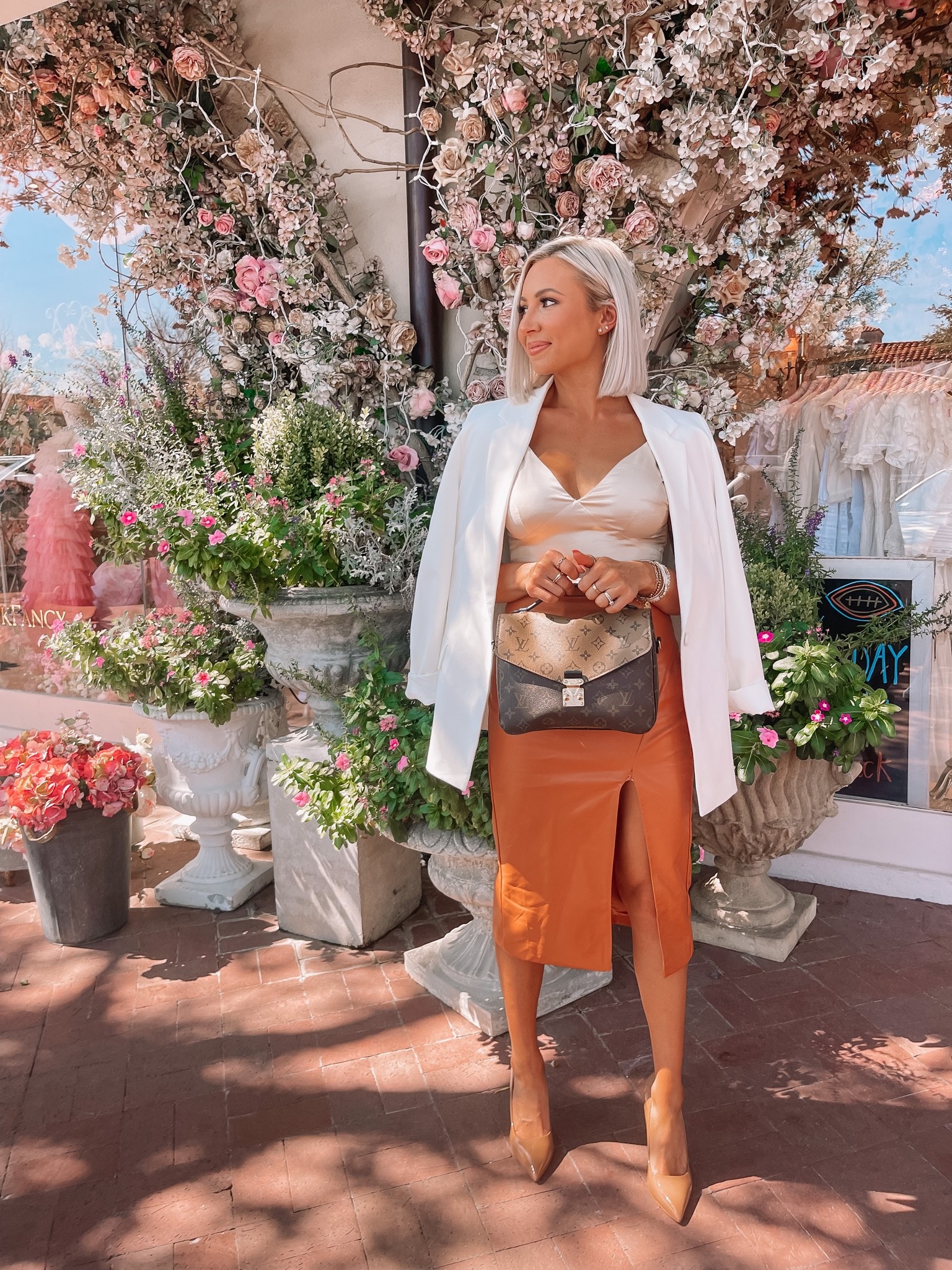 Snappy casual outfit in this faux leather midi skirt and satin cami. This amazon blazer is a dream. I’m wearing a small in the cami and blazer and a medium in the skirt. Tan pumps are true to size 

#LTKSeasonal #LTKunder50 #LTKCon