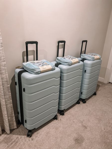 Target has such cute traveling suitcases. They also have a matching 7-piece packing cube set too! I got 3 for hubby, baby, and I for our trip back home. I got the large checked suitcase size. Theres also a carry on size too and several different colors. 

#LTKtravel #LTKfamily