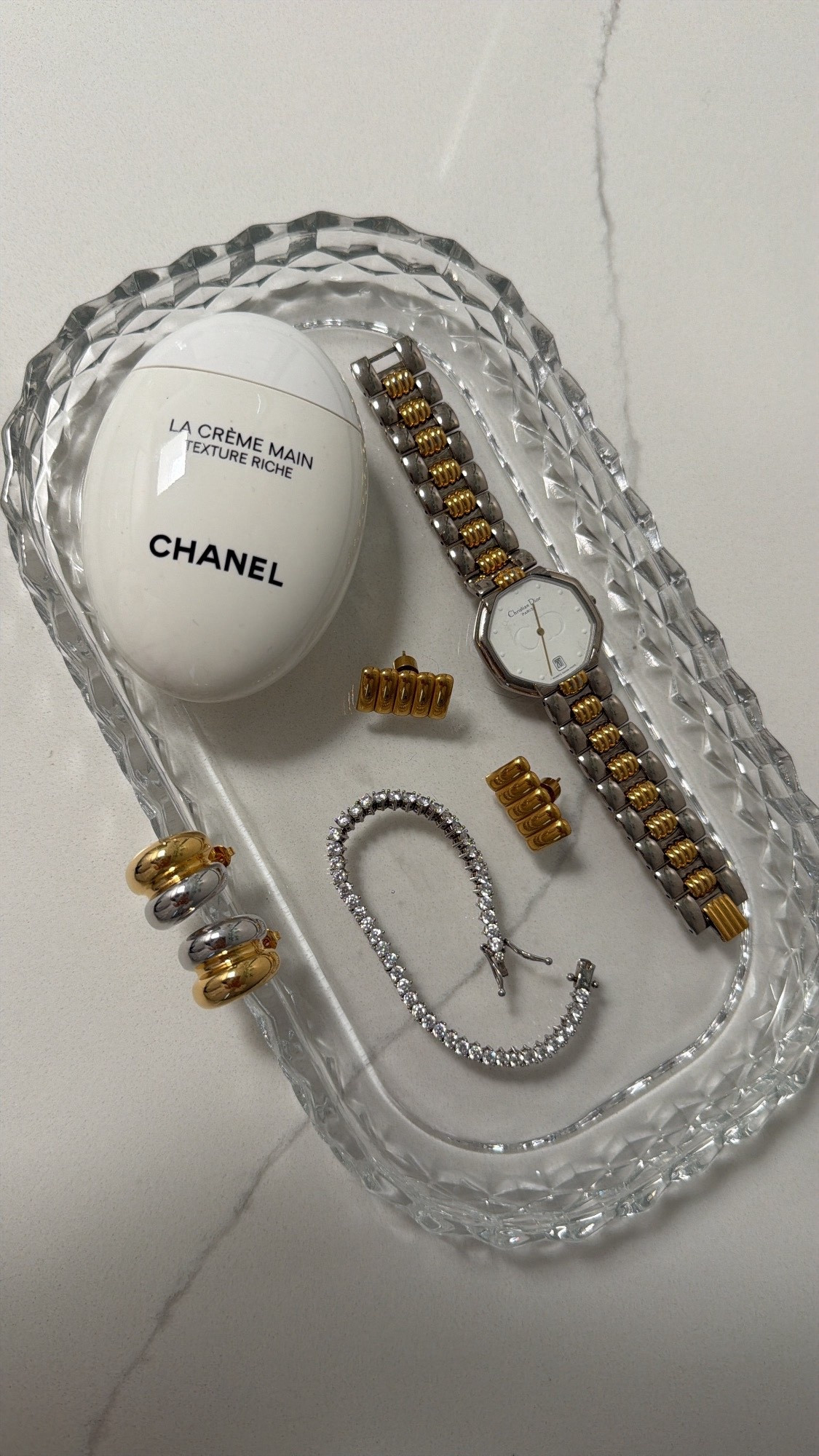 Use code: CWATTCM and save 10% off Caitlyn minimalist jewelry. Diamond look, tennis bracelet, golden silver earrings, vintage watch, crystal tray, parisan style, jewelry.

#LTKBeauty #LTKSaleAlert