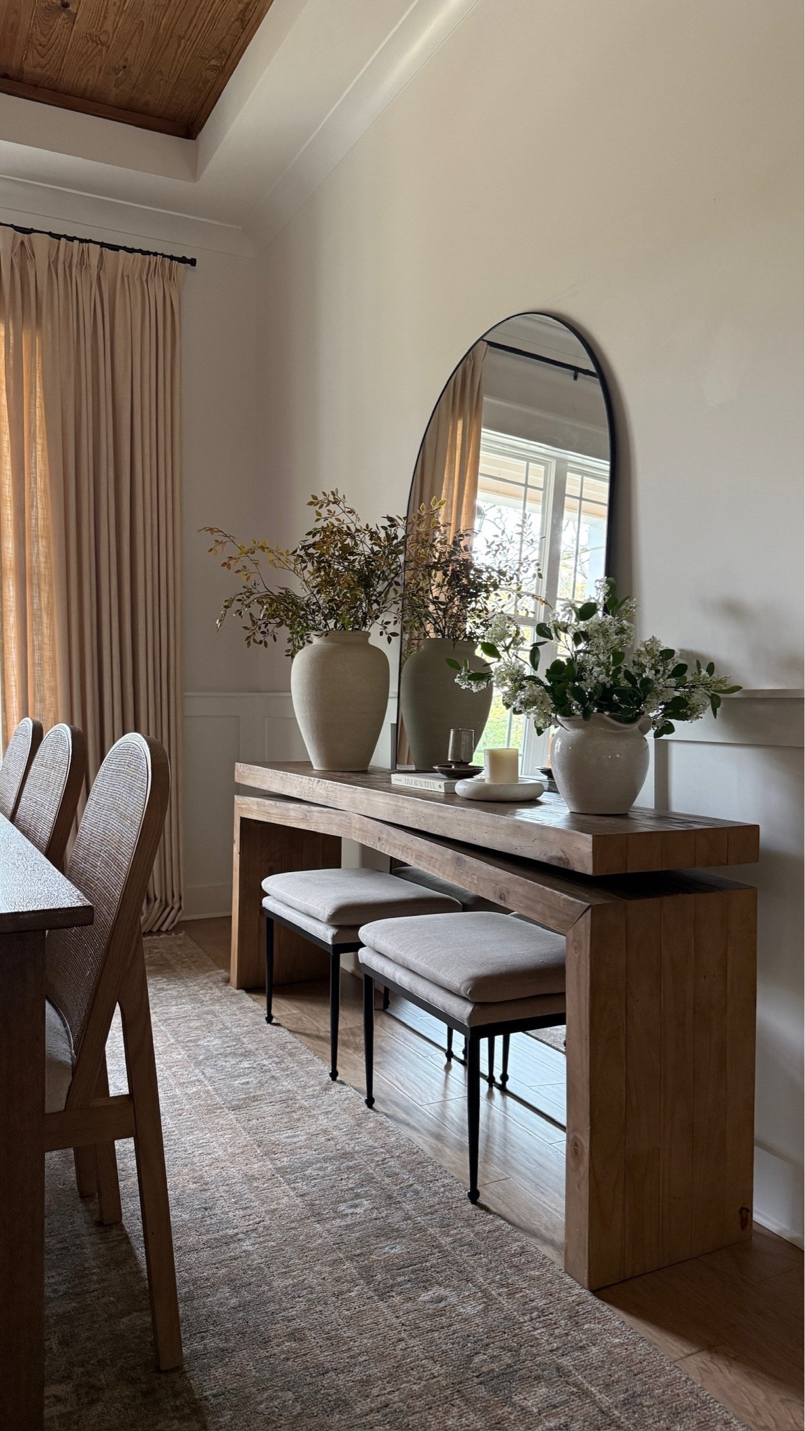 Neutral and layered console table for spring! The ottomans elevate the space while the faux stems bring a softness and pretty texture to the room for the season 🤍

#LTKHome
