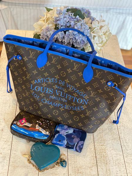 Happy Tote Tuesday! Day 9 of Bag Switch: using my LV Ikat Neverfull in blue with the matching zippy coin, Xmas animation mini pochette and my teal heart coin purse. Will also be adding some non blue items when I leave the house. 

#LTKstyletip #LTKitbag