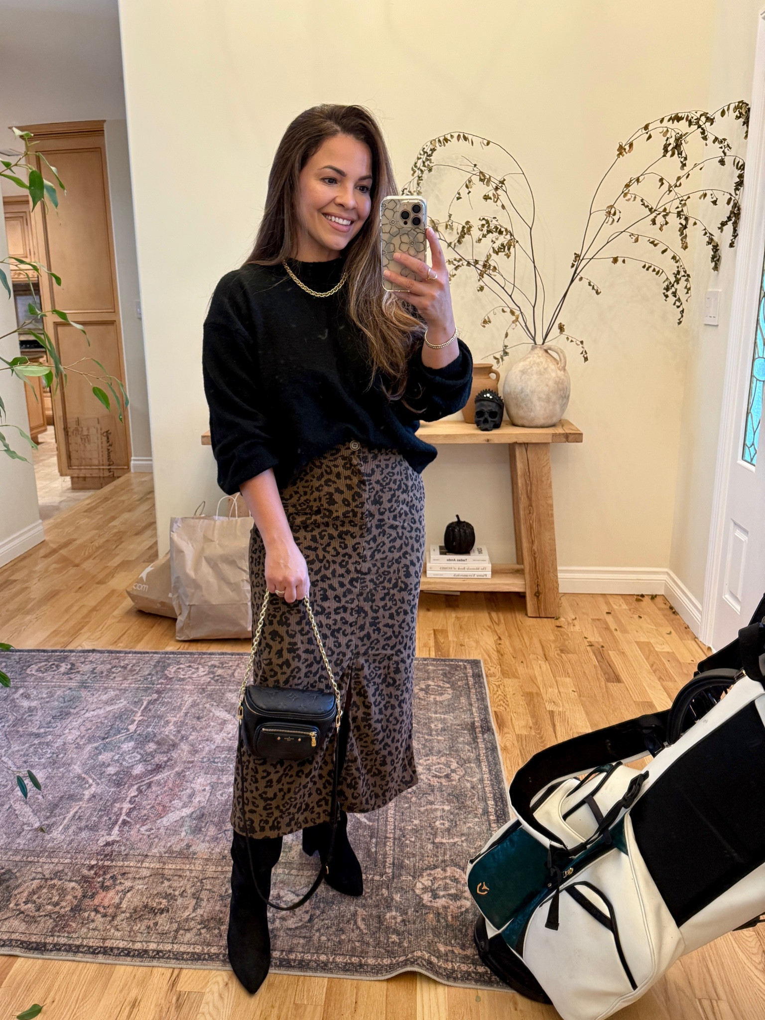 Off to a birthday dinner! Love this leopard skirt. So versatile with stretch. Can dress it up more (heels, off the shoulder top), or down with a ribbed tank and sandals or sneakers.

Sweater: small
Skirt: large
Boots: 6.5
Bag: LV

#LTKFindsUnder50 #LTKStyleTip #LTKMidsize