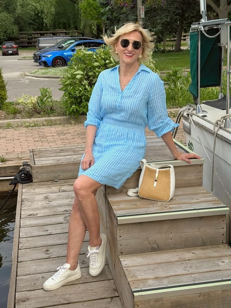 I always come back to classic stripes. 💙 They’re timeless, easy to style, and paired with white sneakers, they make the perfect everyday outfit. Who else loves a dress-and-sneakers combo?

#LTKSeasonal #LTKOver40 #LTKootd