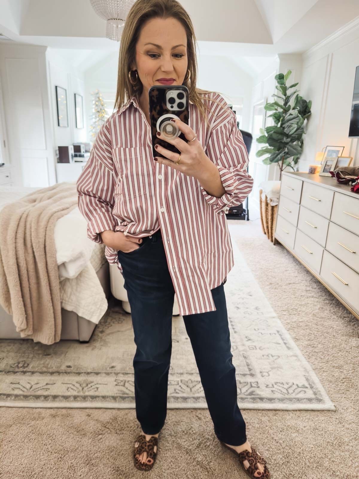I sized down to a small in this boyfriend button down striped shirt for an oversized fit. It’s a great topper for jeans, and mine are 40% off today. ladies blue jeans casual outfit gift idea for her 

#LTKGiftGuide #LTKOver40 #LTKSaleAlert