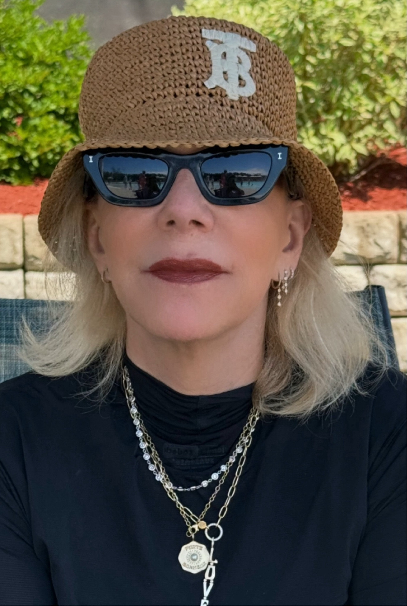 I adore hats! Today, I'm donning my designer raffia bucket hat, inspired by my father who consistently wore a white cloth bucket hat for tennis. I inherited both the hat and my tennis skills from him. The bucket hat, a stylish and practical choice, originated in the 1900s to protect fishermen and farmers from the elements.

#LTKSeasonal #LTKStyleTip