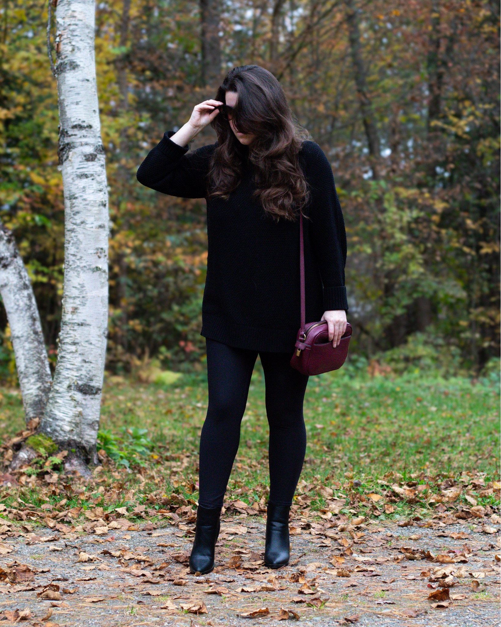 This black tunic sweater is 100% cotton, comes in tons of other colors, and is on sale for $25! I was so surprised with how flattering it is! 

I’m wearing the medium so I’d say it’s TTS. 
Also wearing a medium in the leggings and I LOVE them- I dress them up all the time 

Leggings outfit. Easy mom outfits. Fall outfits with leggings. All black outfit 

#LTKsalealert #LTKstyletip #LTKfindsunder50