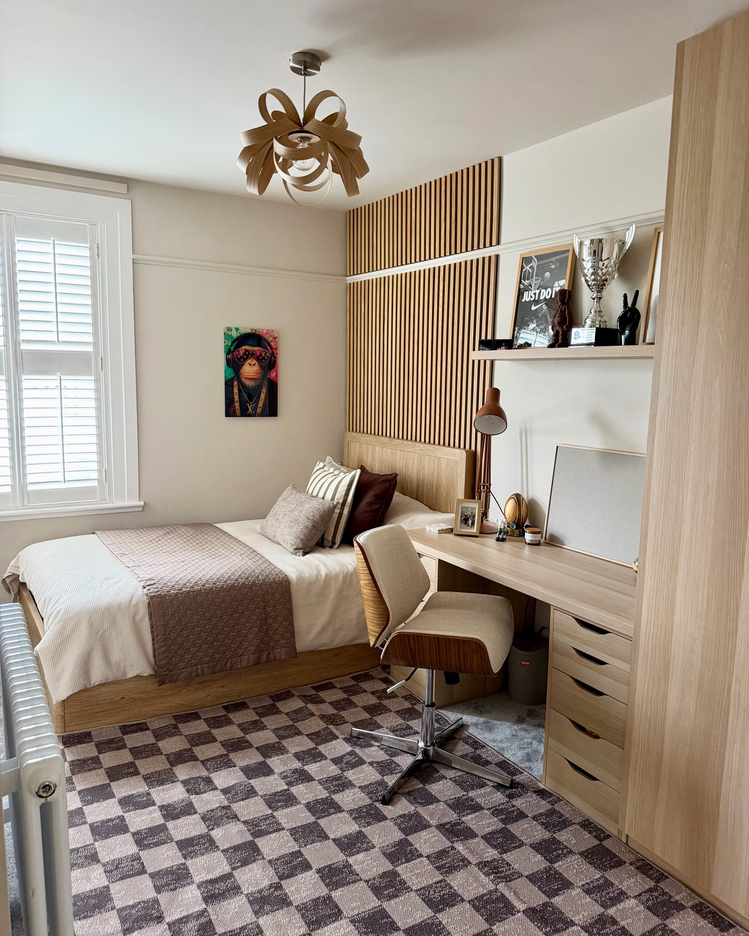 Romans Room is done ✔️ 

I am completely blown away! Rome’s new room has officially exceeded all my expectations. 🙌. Roman had a very specific vision—"Oak, Nike and YSL" 😂—and @whitefeatherinteriorinspo delivered yet again. Layla created a seriously cool, classy space that he can grow into without it ever feeling dated! 🤎🤎🤎🤎

Paint - Rolling Fog light 271 from Little Greene
Wardrobe & Desk - Ikea
Ottoman Bed - Dusk 
Throw - H&M 
Rug- kukoonrugs 
Cushions- H&M 
Lamp - Angleposie 
Supreme Picture - displate
YSL Monkey- artdesignawallart
Chair - John Lewis  
Panels - Howdens  
Light shade - Tom Raffield 
Bedding - M&S 
Shelves- dunelm

#LTKsale