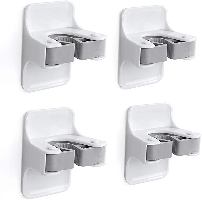 Broom Holder, McoMce Sturdy Broom Holder Wall Mount, Broom Gripper Holds Self Adhesive No Drillin... | Amazon (US)