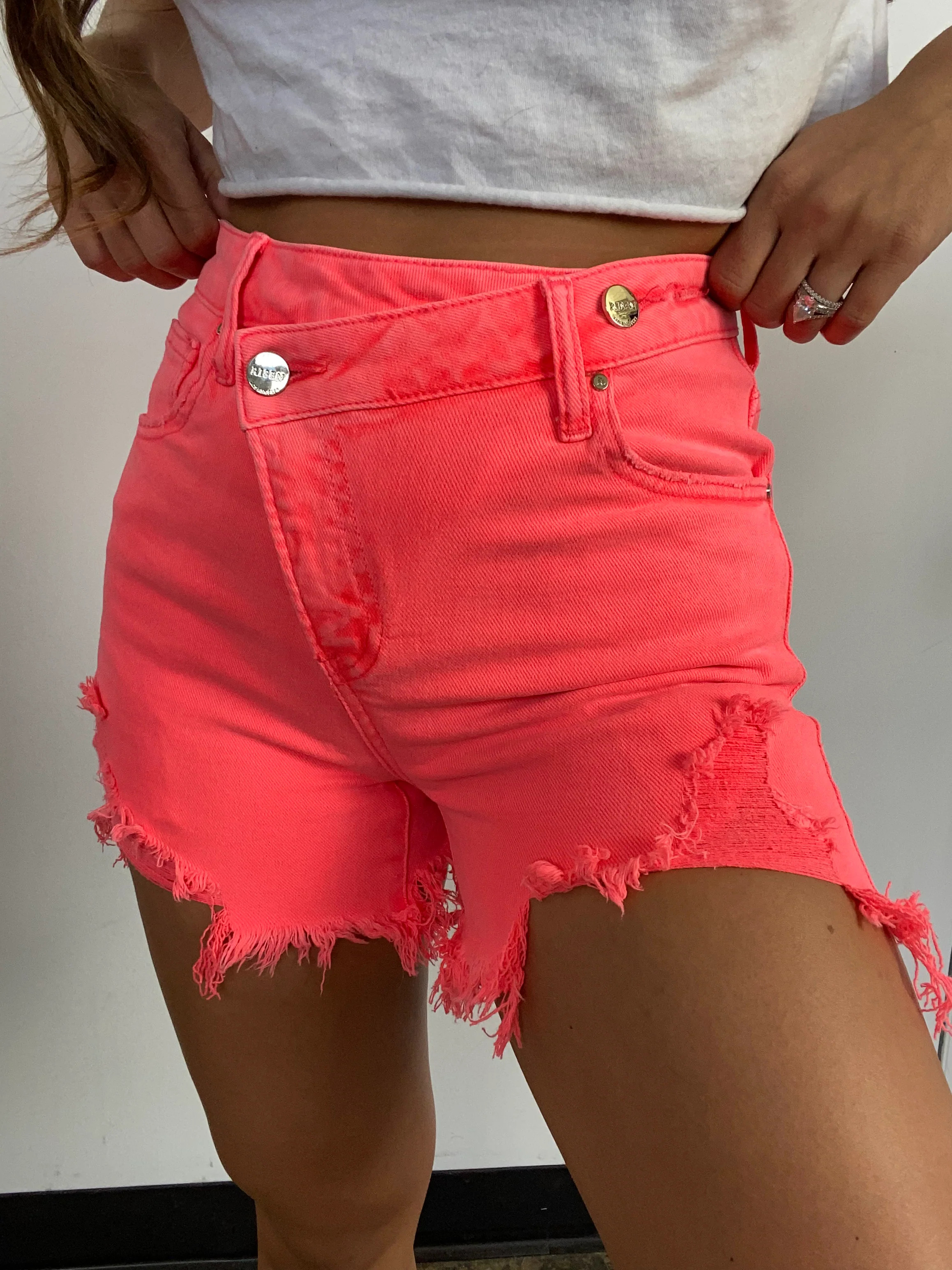Lindsey Asymmetrical Distressed Shorts- Coral Pink | Willow Boutique