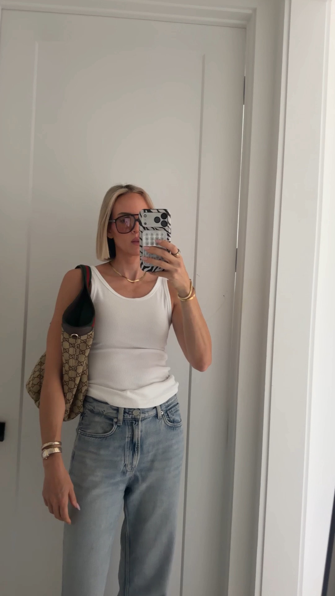 Got a new pair of late summer sandals. I love that they’re a bit elevated but still casual. Runs tts. Also these jeans are tall girl friendly, and some of the comfiest jeans I own. I’m always grabbing for them because of that. Size down one size if you don’t want them to loose at the waist. I kinda like it. Wearing a small in the target tank. ￼

#LTKootd #LTKdayinmylife #LTKTall