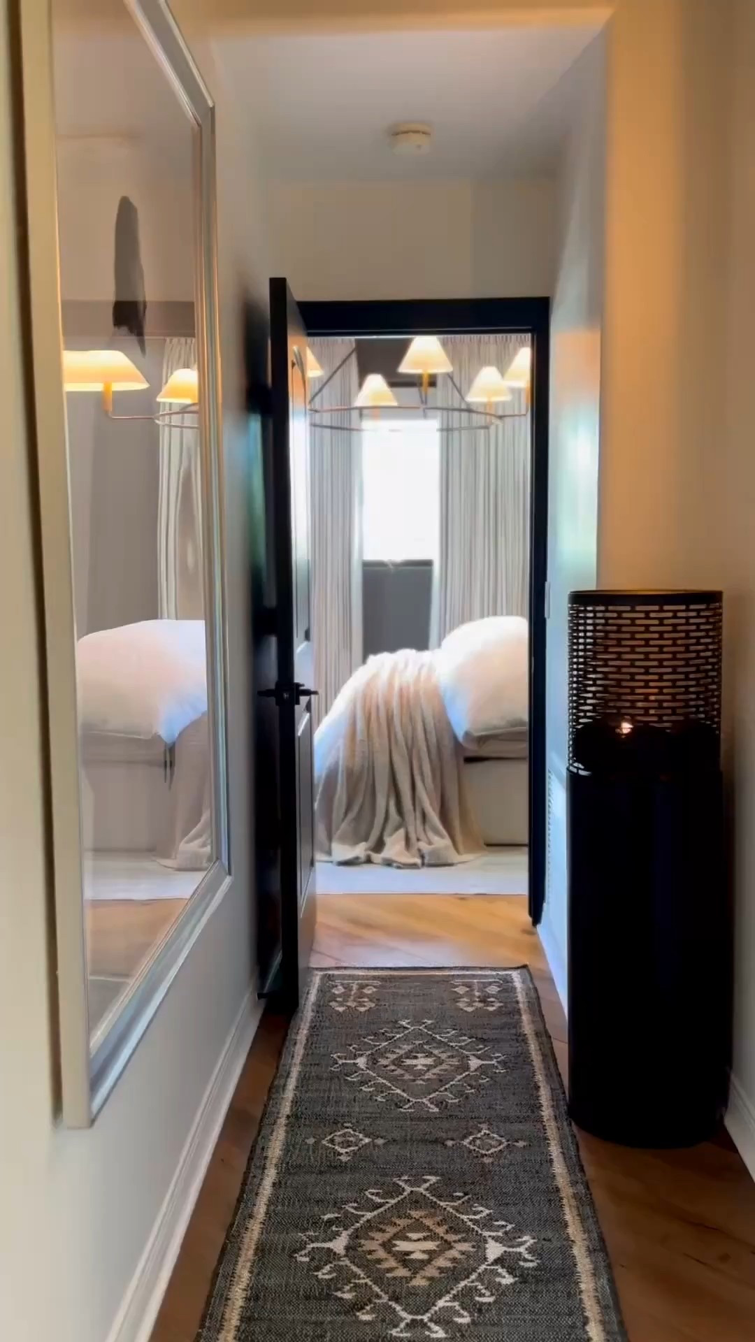 I love this view from my hallway leading into the guest bedroom. It feels magical at night and during the day.

Southwestern Rug. Moody home decor. Wayfair Home Decor. Large Candle Holder. Amazon Home Decor  

#LTKHome #LTKFindsUnder100