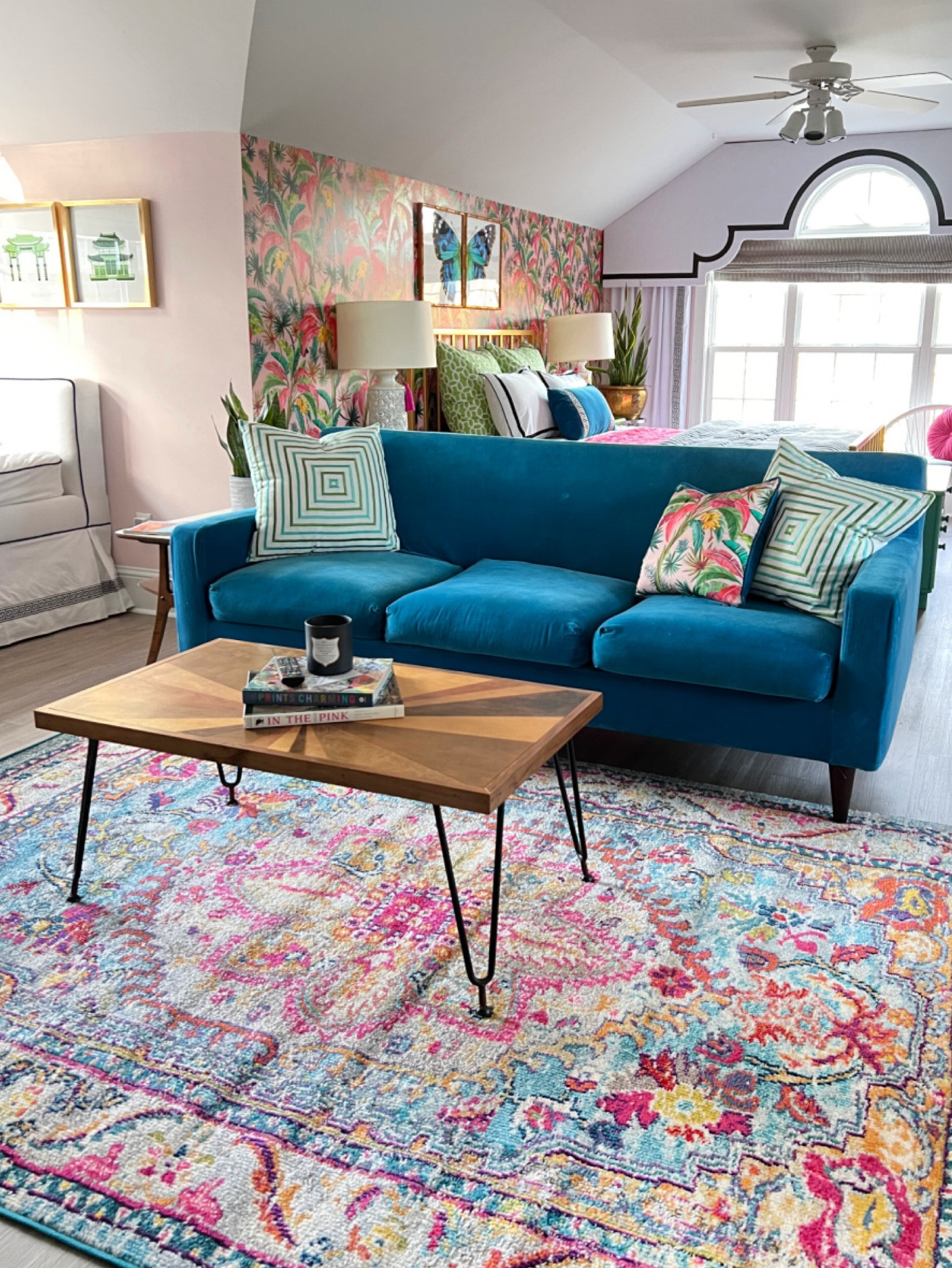Multi color rug, pink and blue rug, blue velvet sofa, palm leaf wallpaper, pink room, guest room, girls room, mid century coffee table

#LTKhome