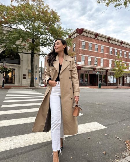 Kat Jamieson wears a classic trench coat with cream denim jeans and a black v neck sweater. 

#LTKSeasonal #LTKfindsunder100 #LTKworkwear